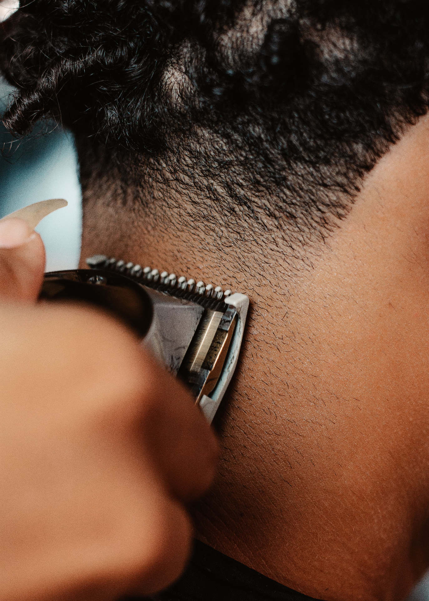 Close-up skin fade with clippers